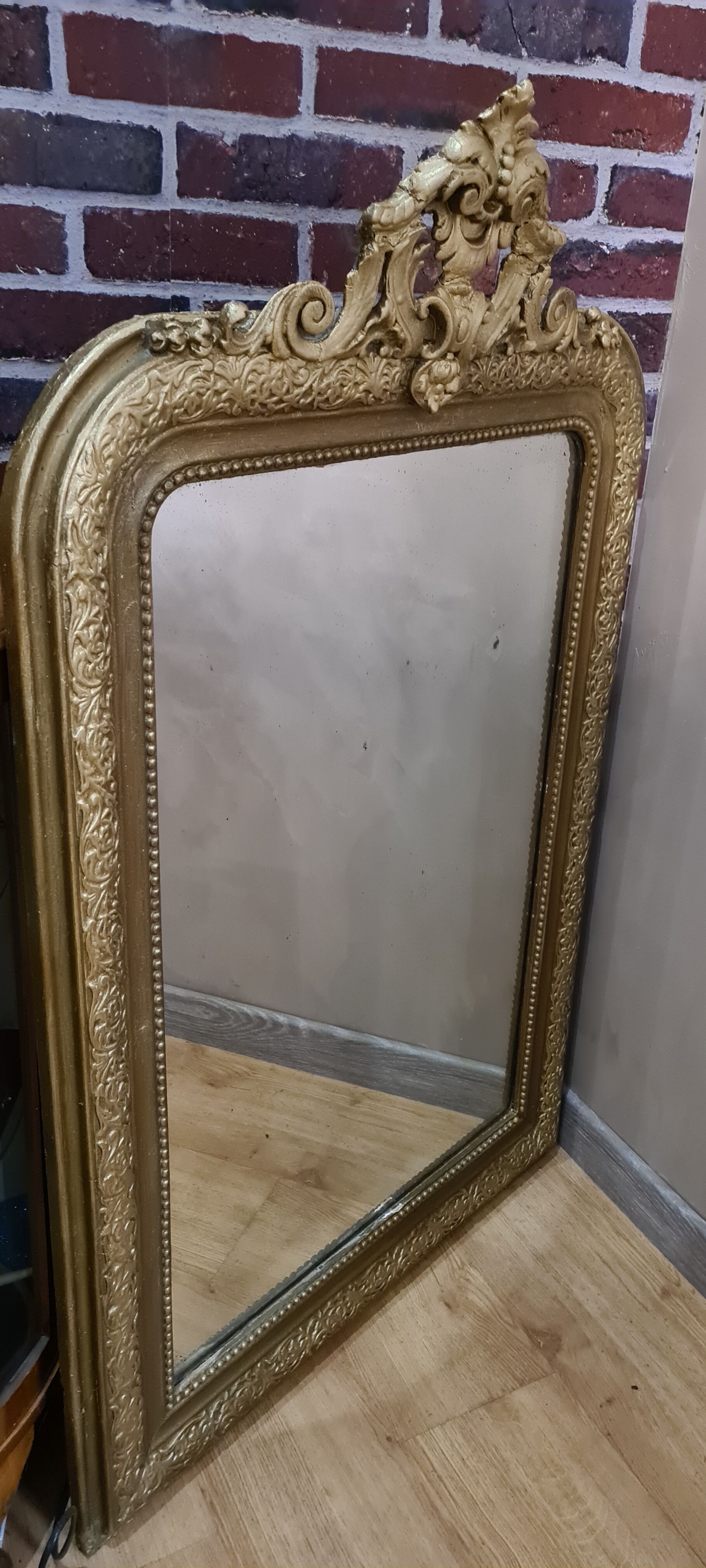Old Louis Philippe style mirror in gilded wood with pediment