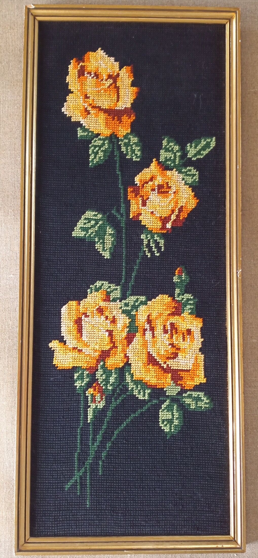 Golden frame with ancient canvas of yellow roses