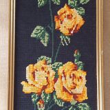 Golden frame with ancient canvas of yellow roses