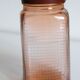 Vintage pink glass grocery jar
