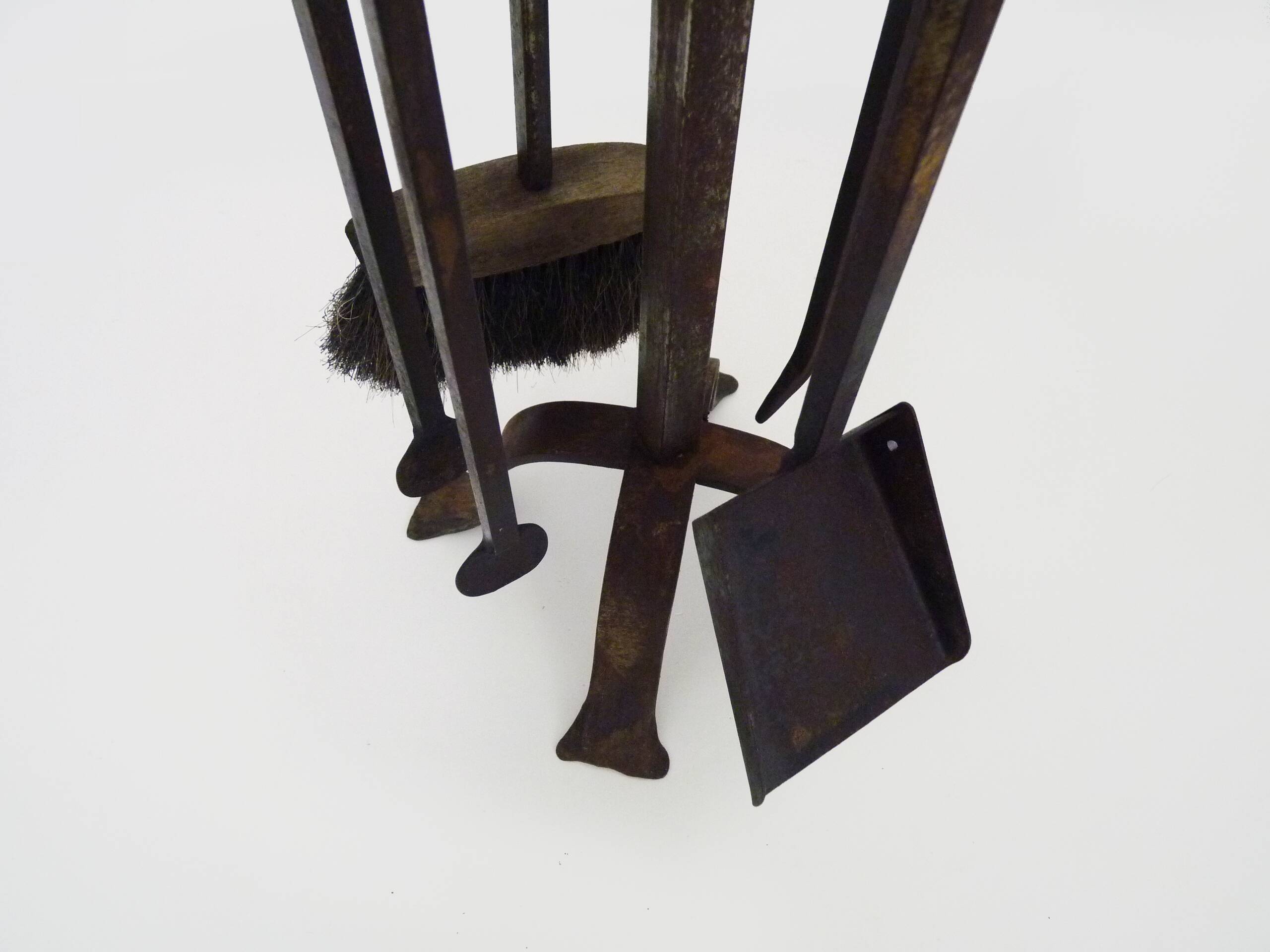 Pair of wrought iron andirons with 19th century fireplace set