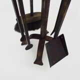 Pair of wrought iron andirons with 19th century fireplace set
