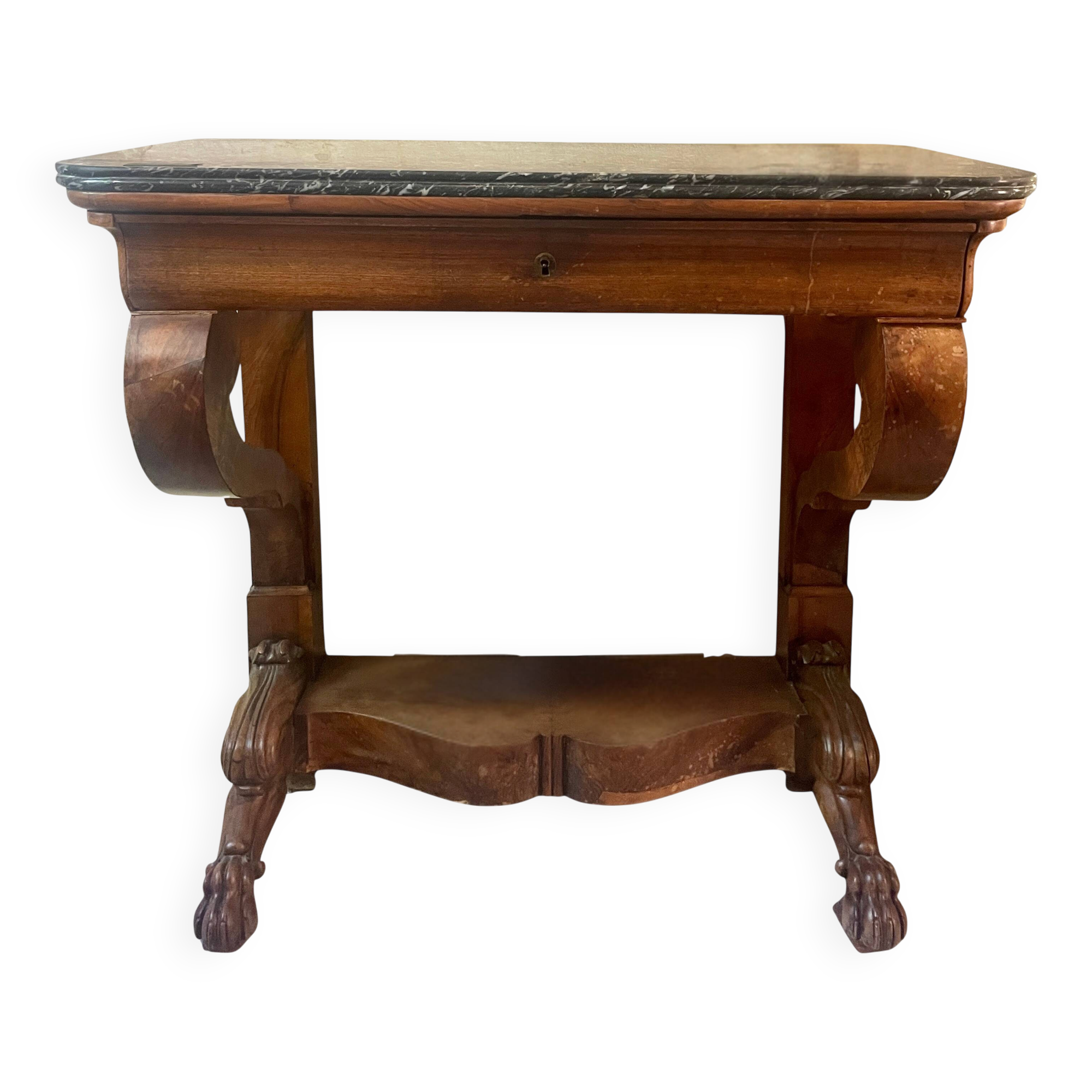 Console inlaid with black marble and lion's paw legs.