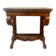 Console inlaid with black marble and lion's paw legs.