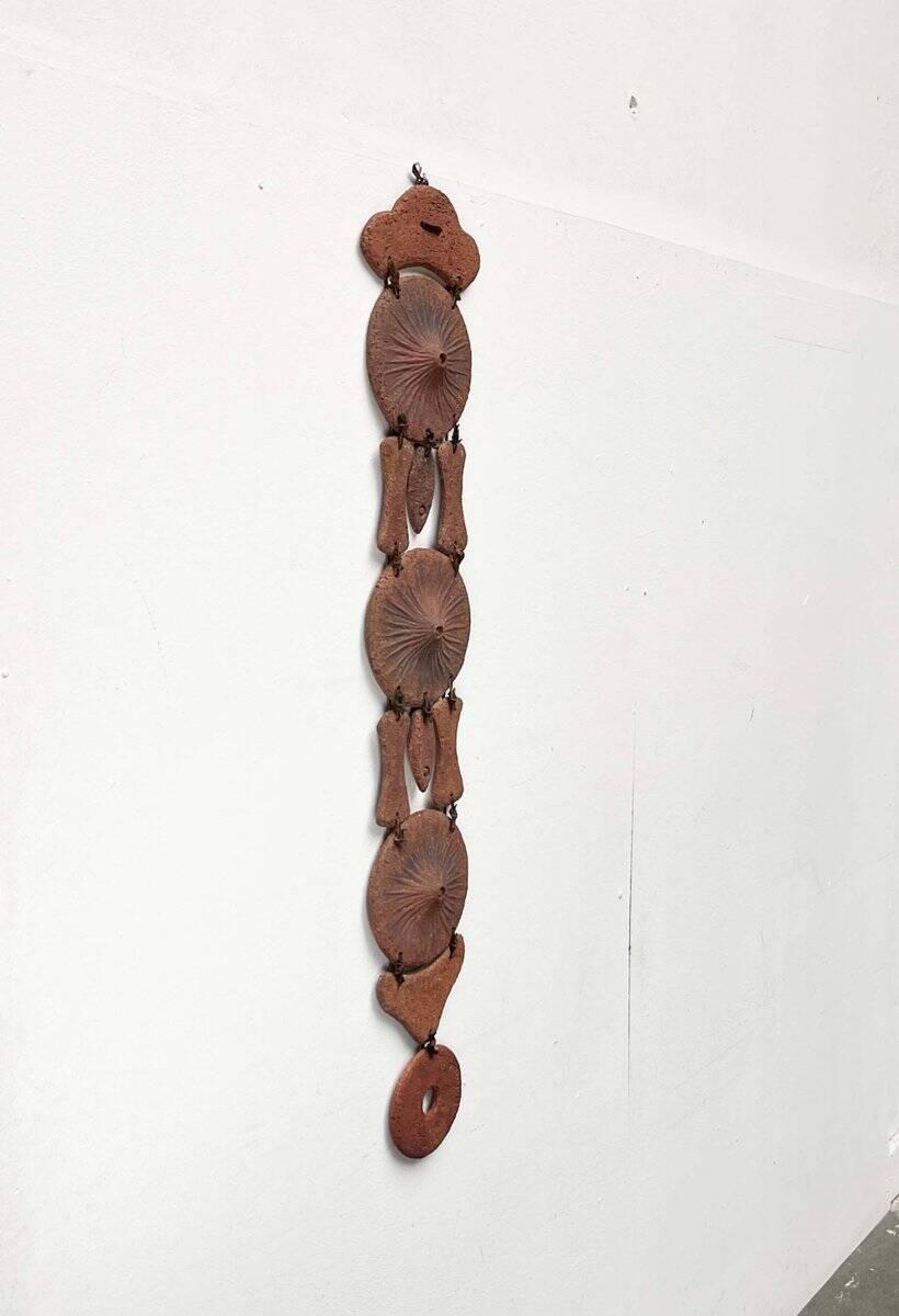 Wall suspension of Danish studio pottery in mid-century brutalist modernist style by Clara Helmich, 1979.