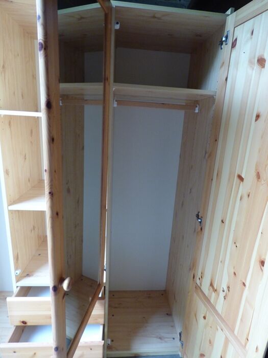 Wardrobe three doors, one with mirror, three drawers in solid pine wood