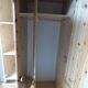 Wardrobe three doors, one with mirror, three drawers in solid pine wood
