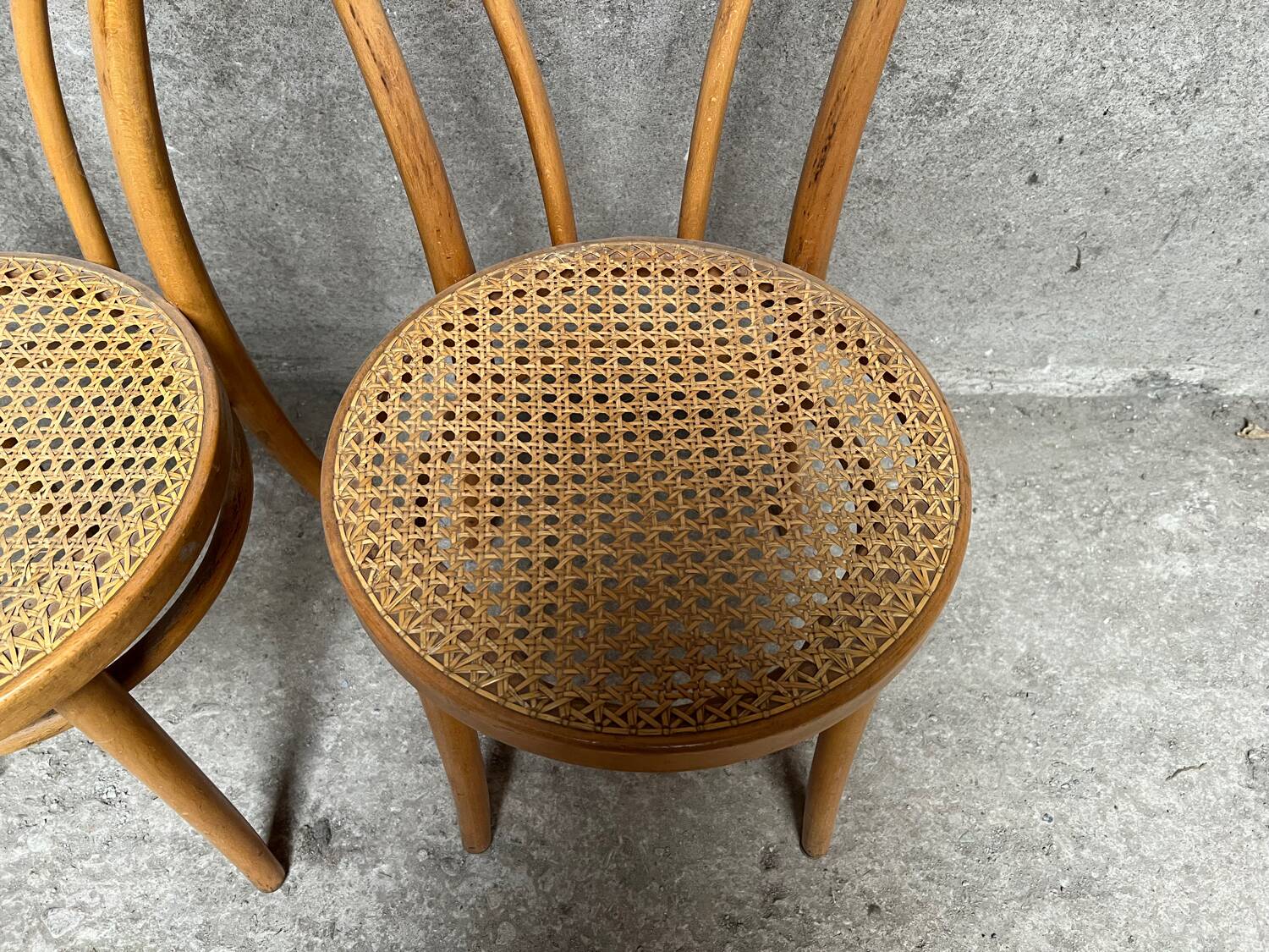 Set of 4 vintage bistro chairs in curved wood and cane seats 1950 1960