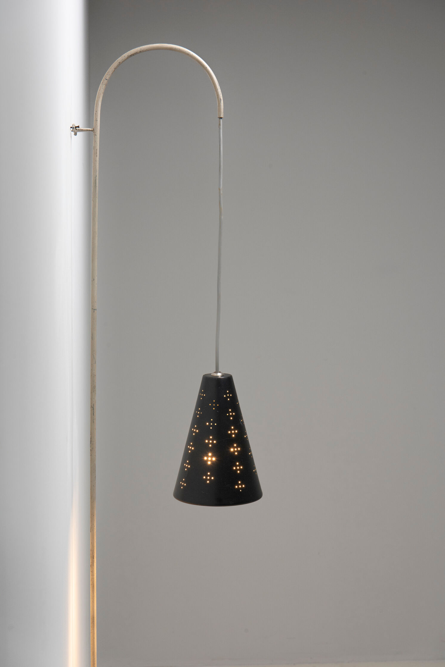 Hanging wall lamp with black perforated cap, 1960's