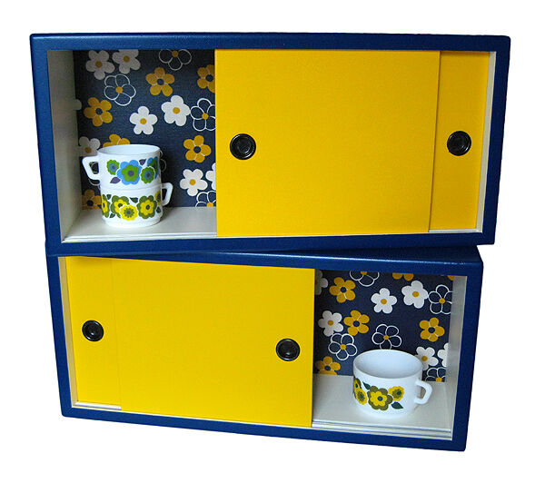 Wall shelves with sliding doors