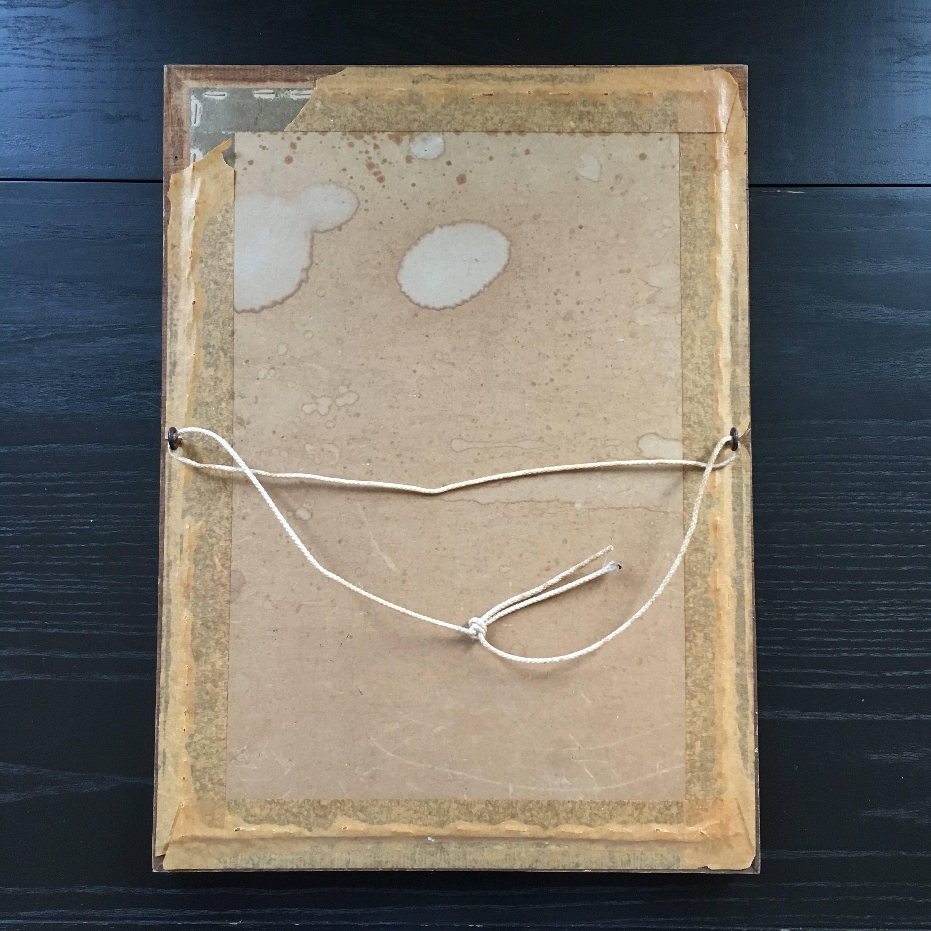 Antique mirror in ornate wood