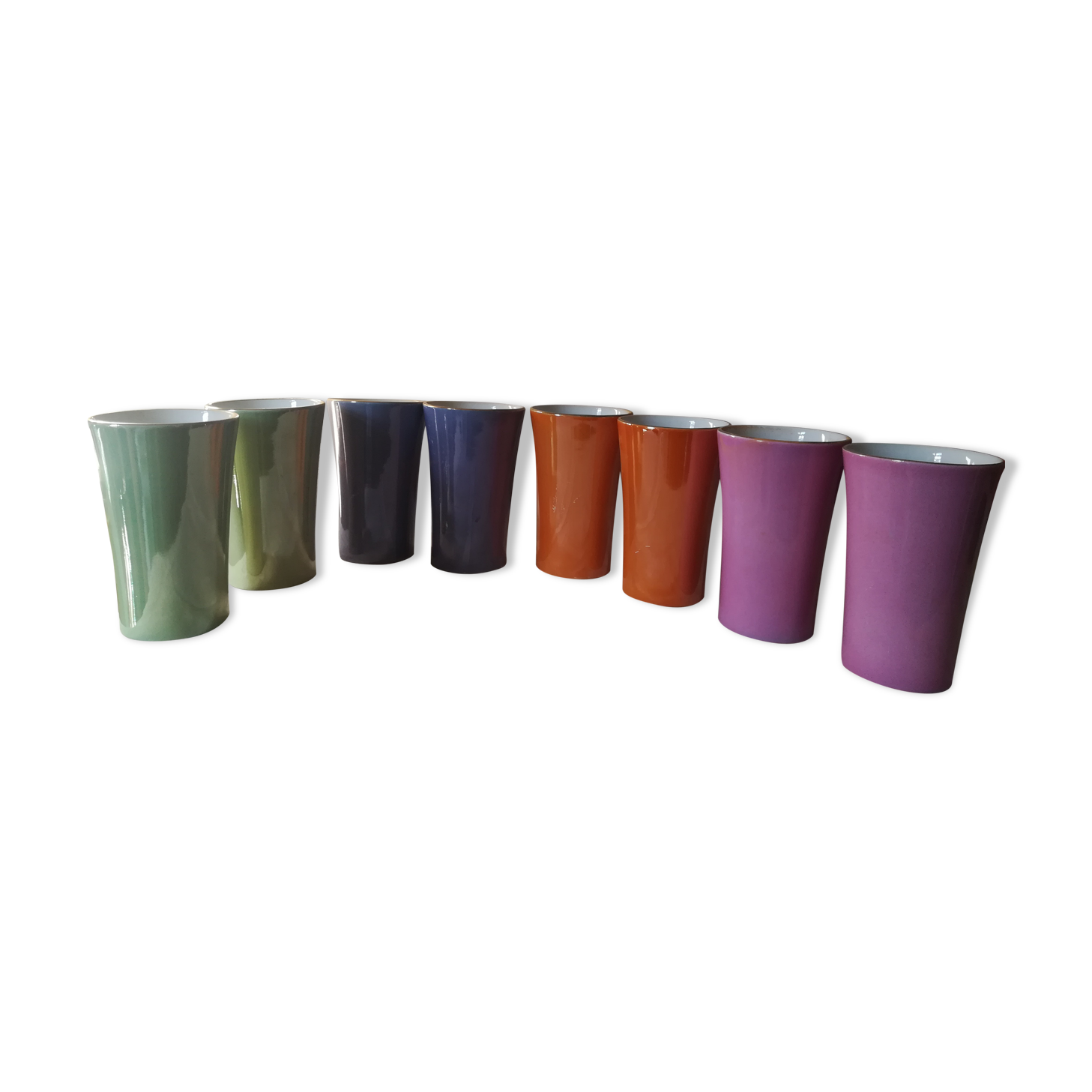 8 coloured cups in earthenware
