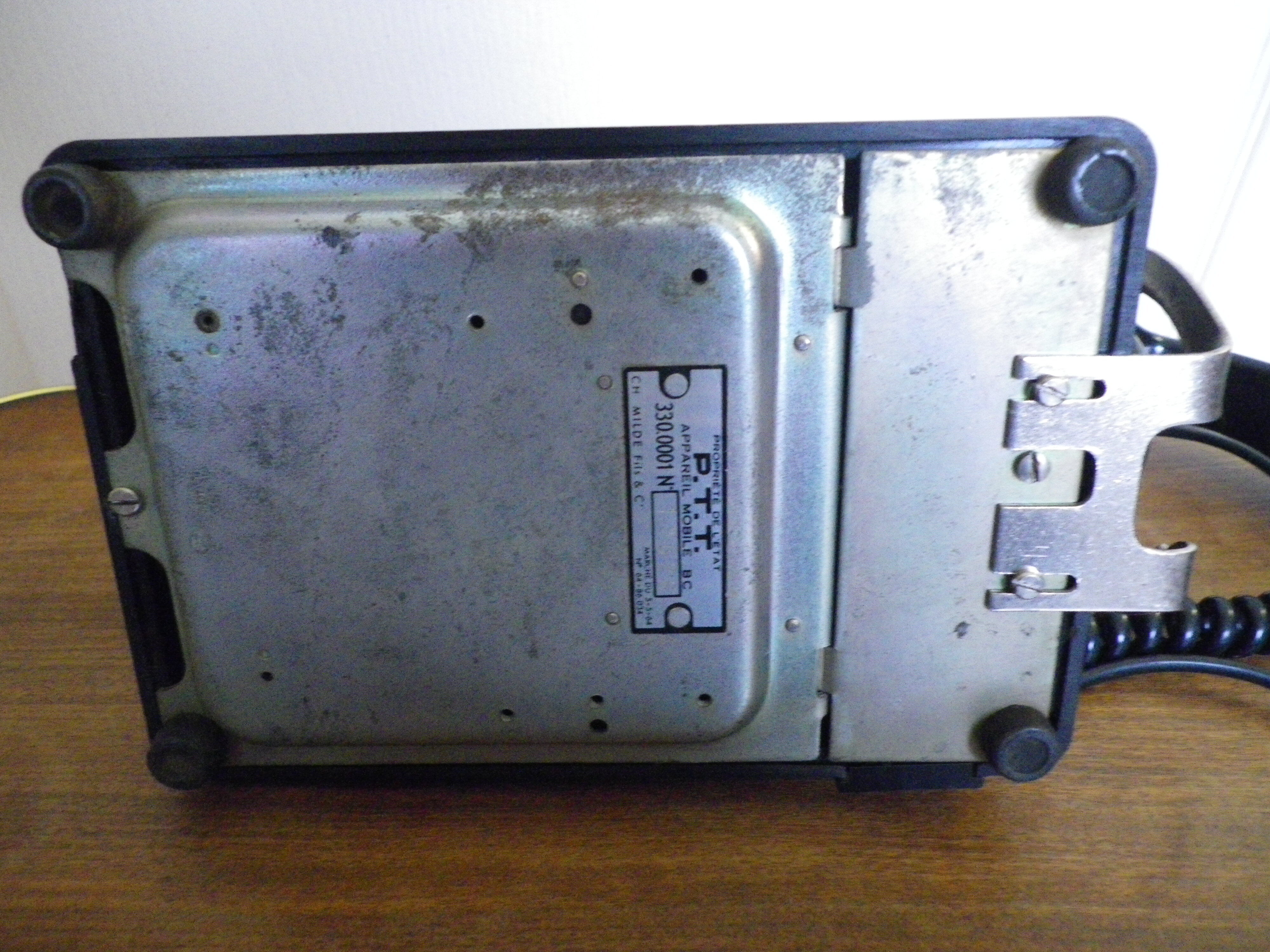 Black bakelite phone with earphone