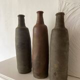 Antique terracotta cider bottles