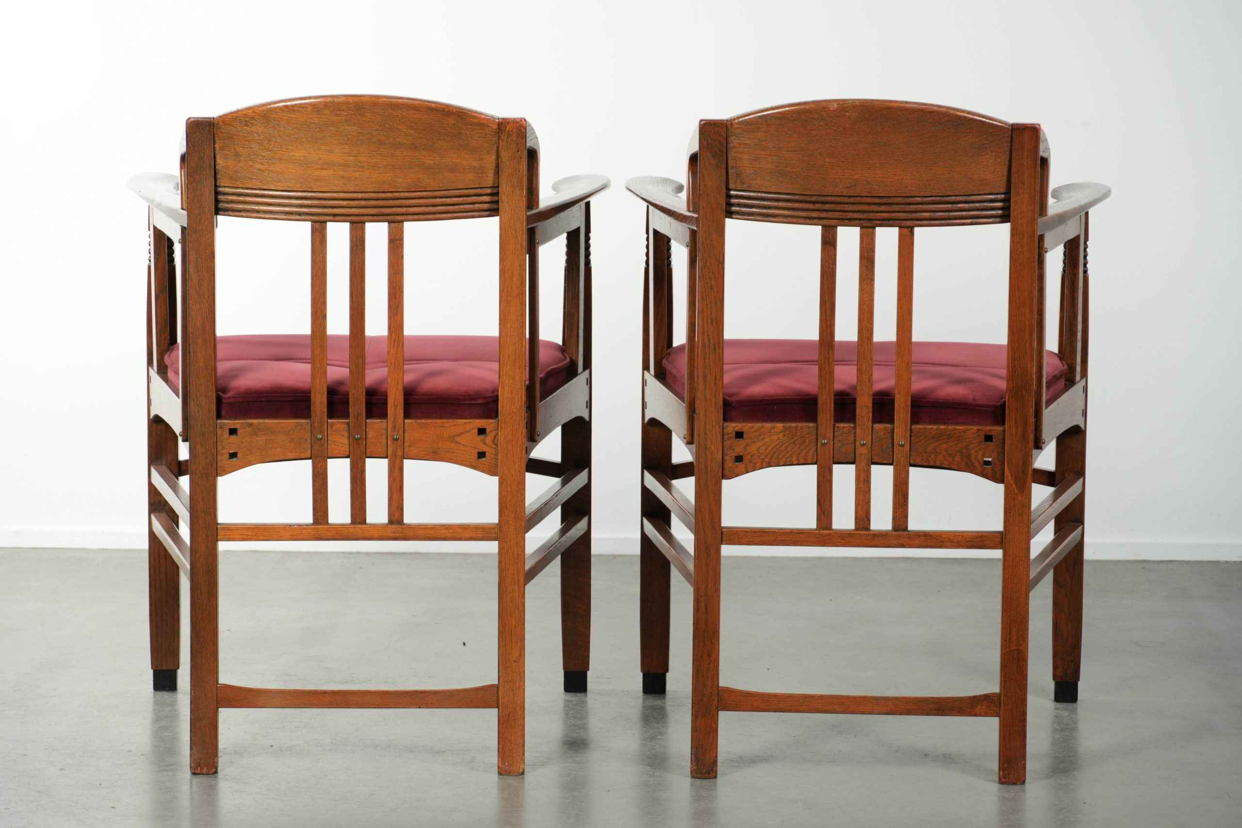 Set of two Art Nouveau design dining chairs with  red fabric upholstery