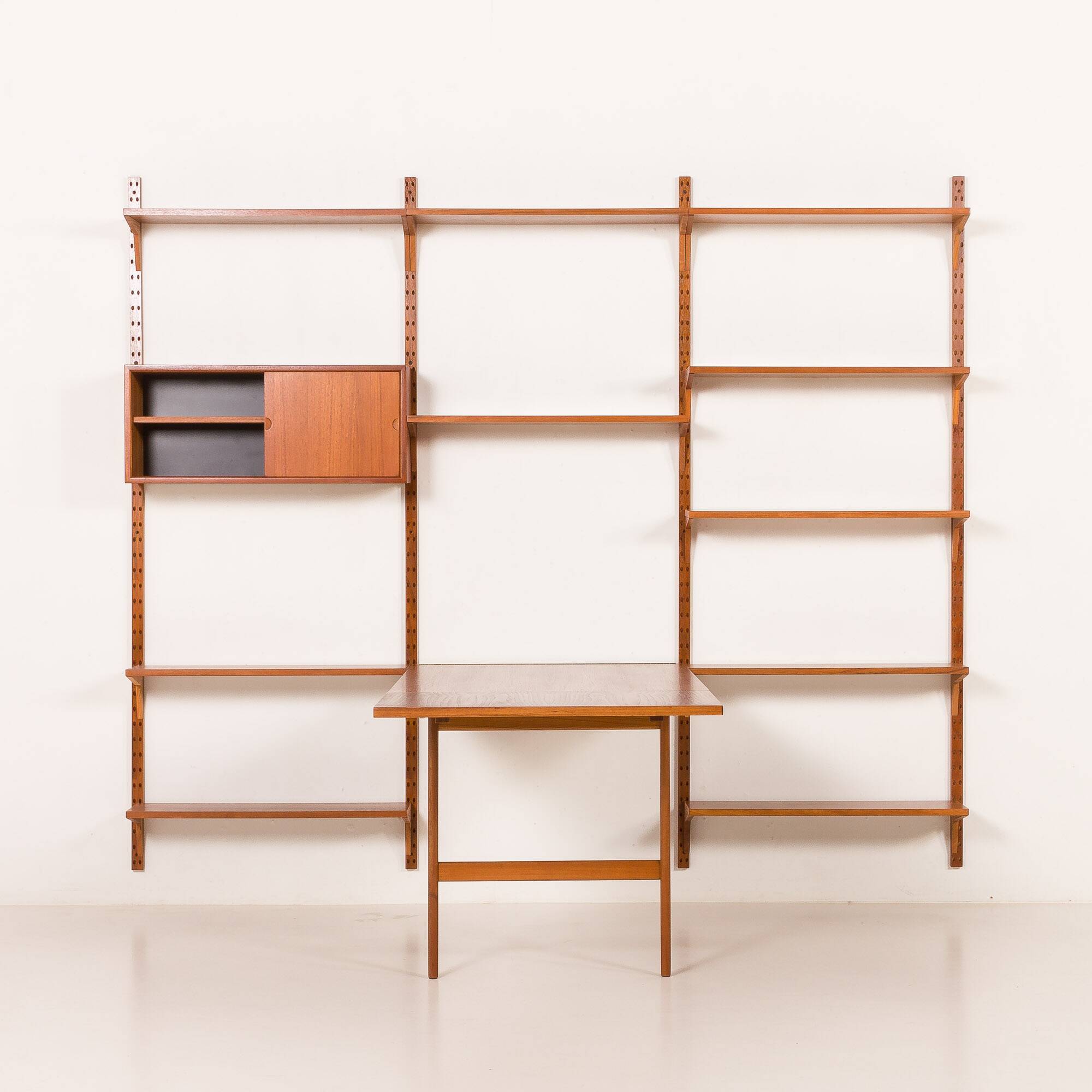 Poul Cadovius rare 3 bay wall unit with a large desk or table for Cado