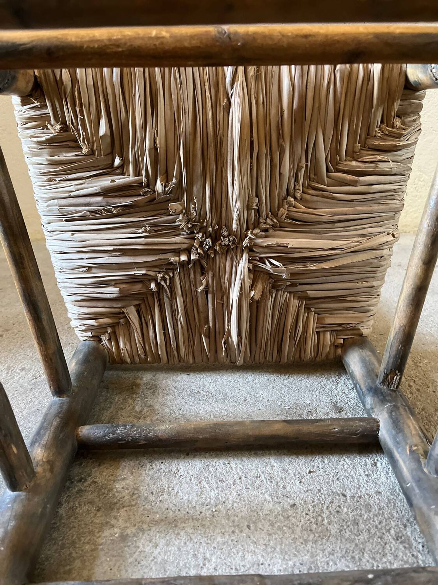 Old turned and stuffed wooden chair