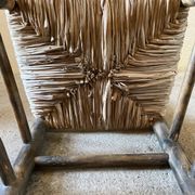 Old turned and stuffed wooden chair