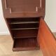 Vintage wooden secretary cabinet with storage.
