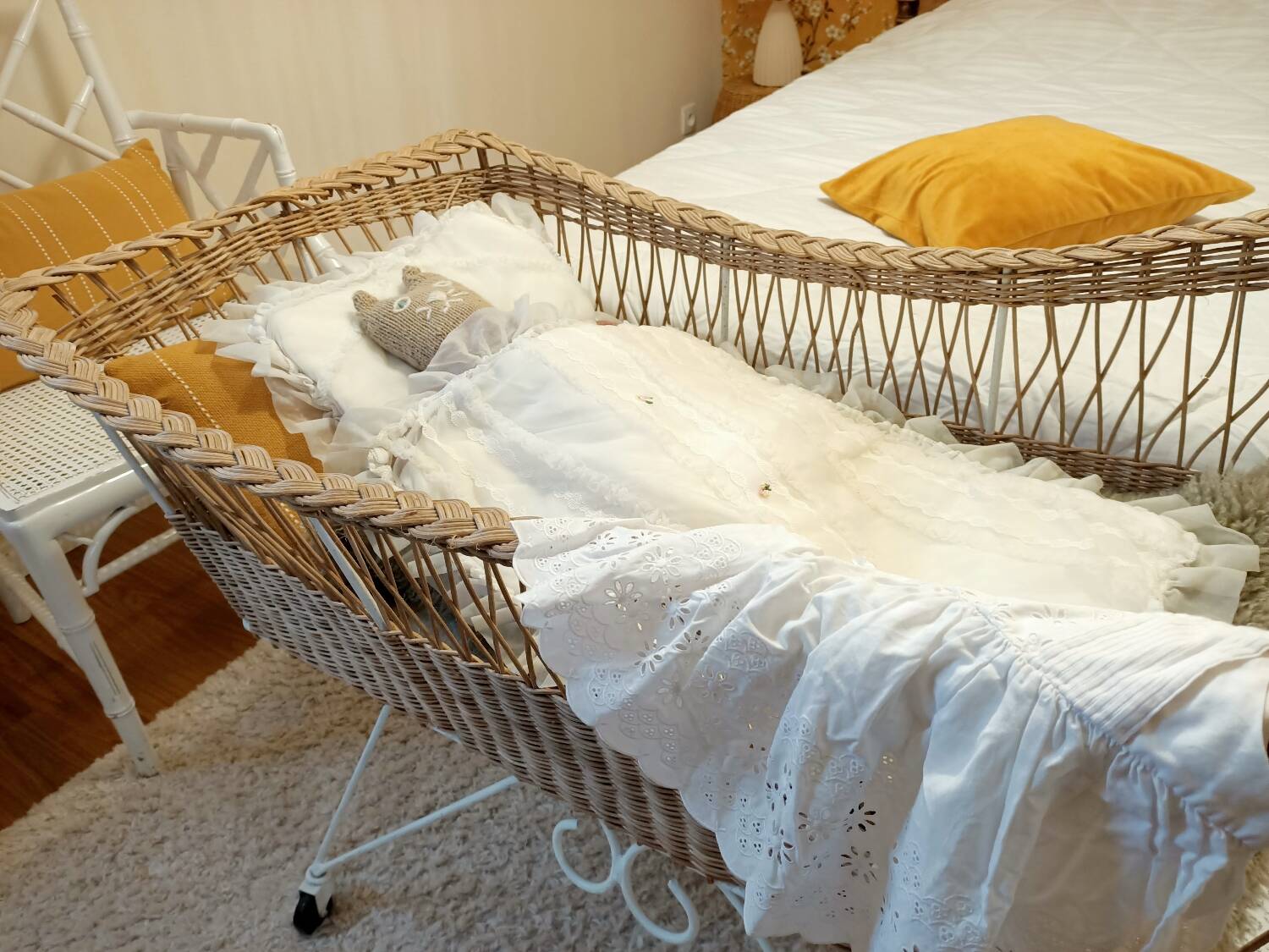 Rattan and wrought iron cradle