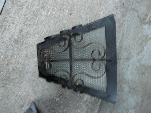 pair of wrought iron lanterns and granite glass