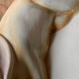 Very large serving dish with hares and vegetables.