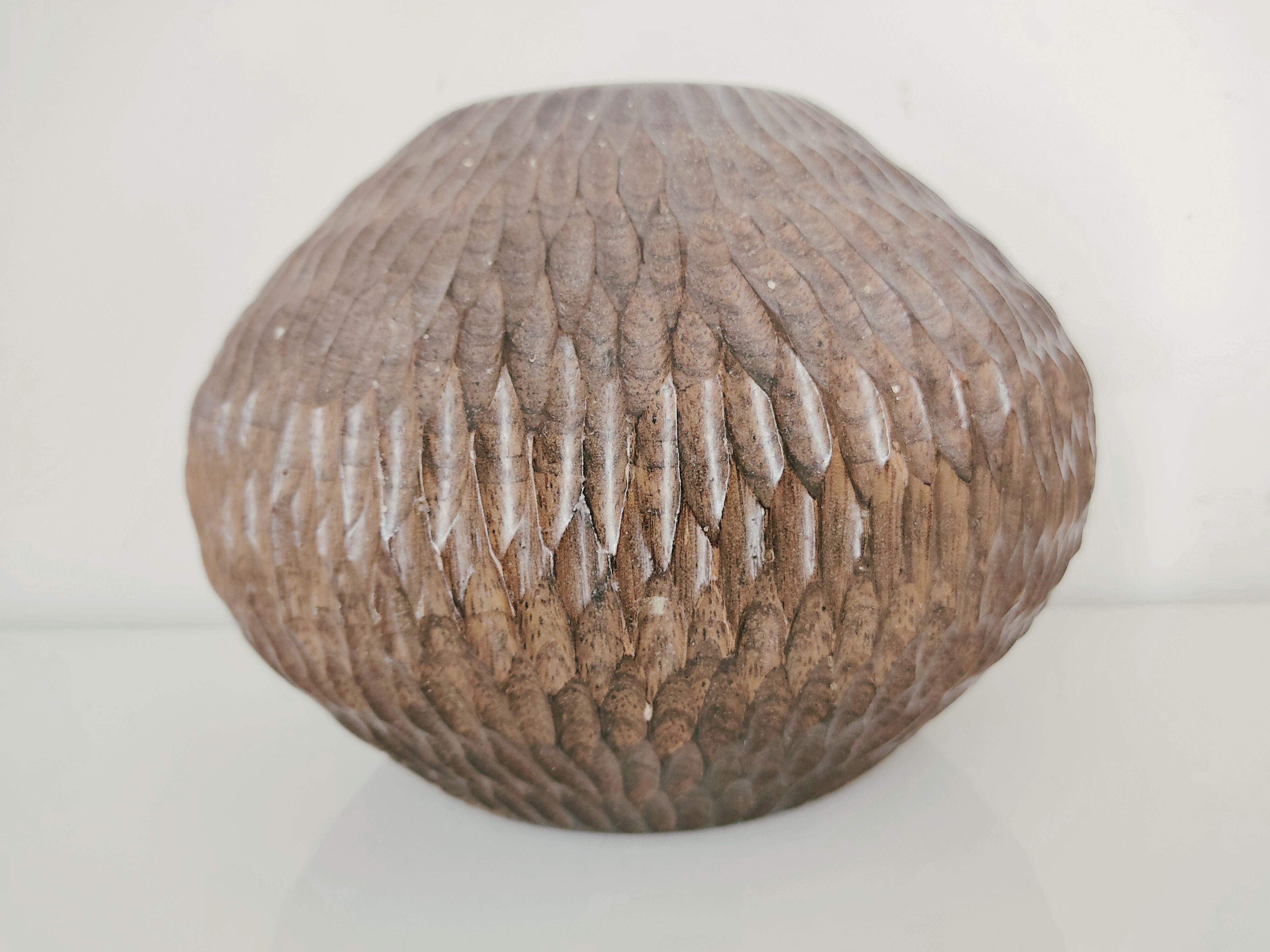 Carved wooden vase