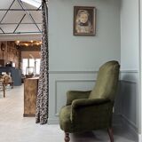 Green velvet tub chair