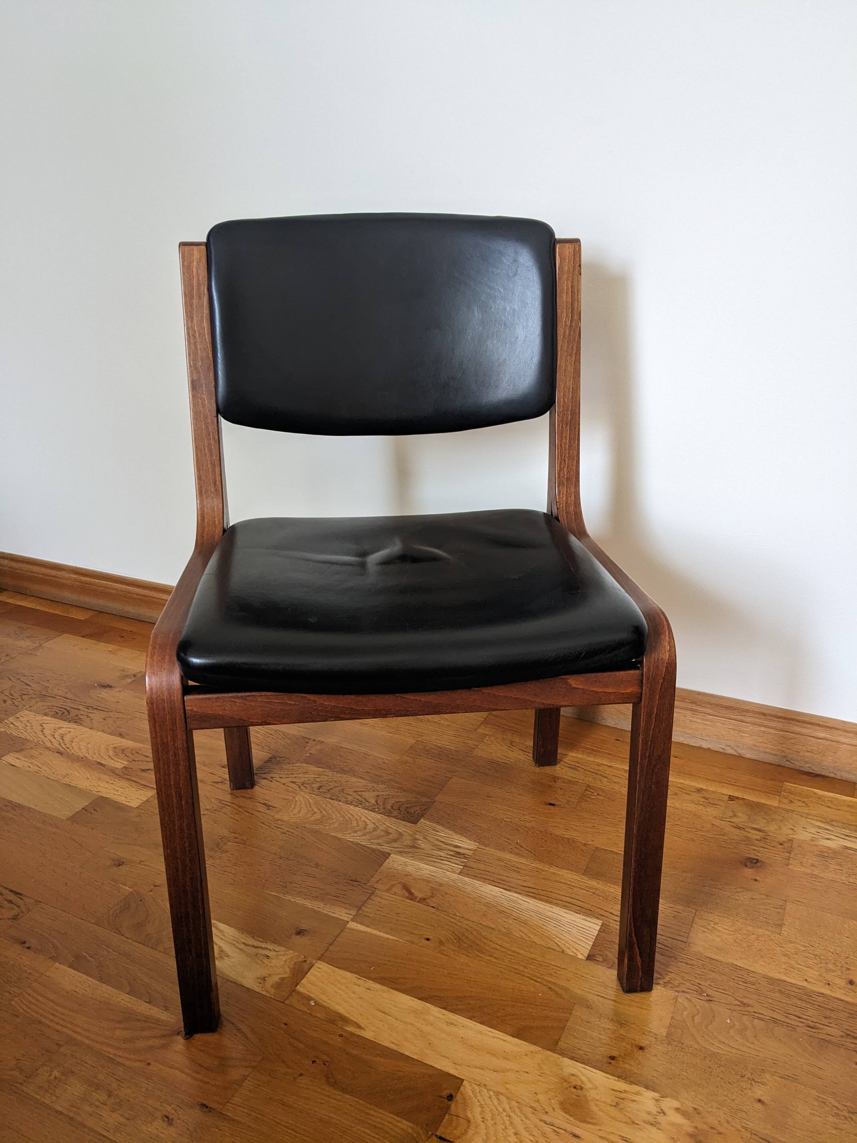 Vintage leather and wood chair pair