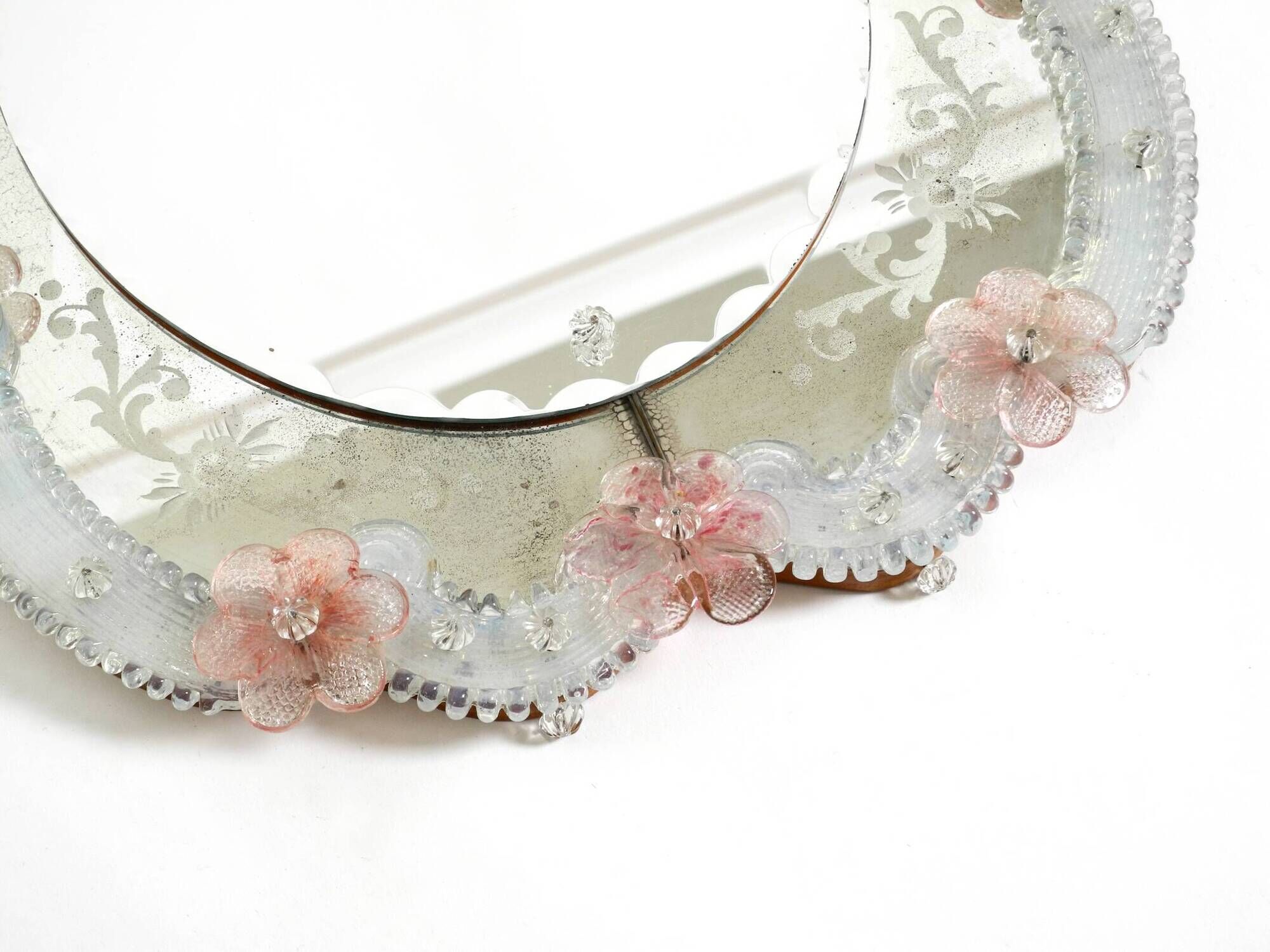 Italian mid-century wall mirror with a Murano glass frame and blossoms