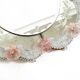 Italian mid-century wall mirror with a Murano glass frame and blossoms