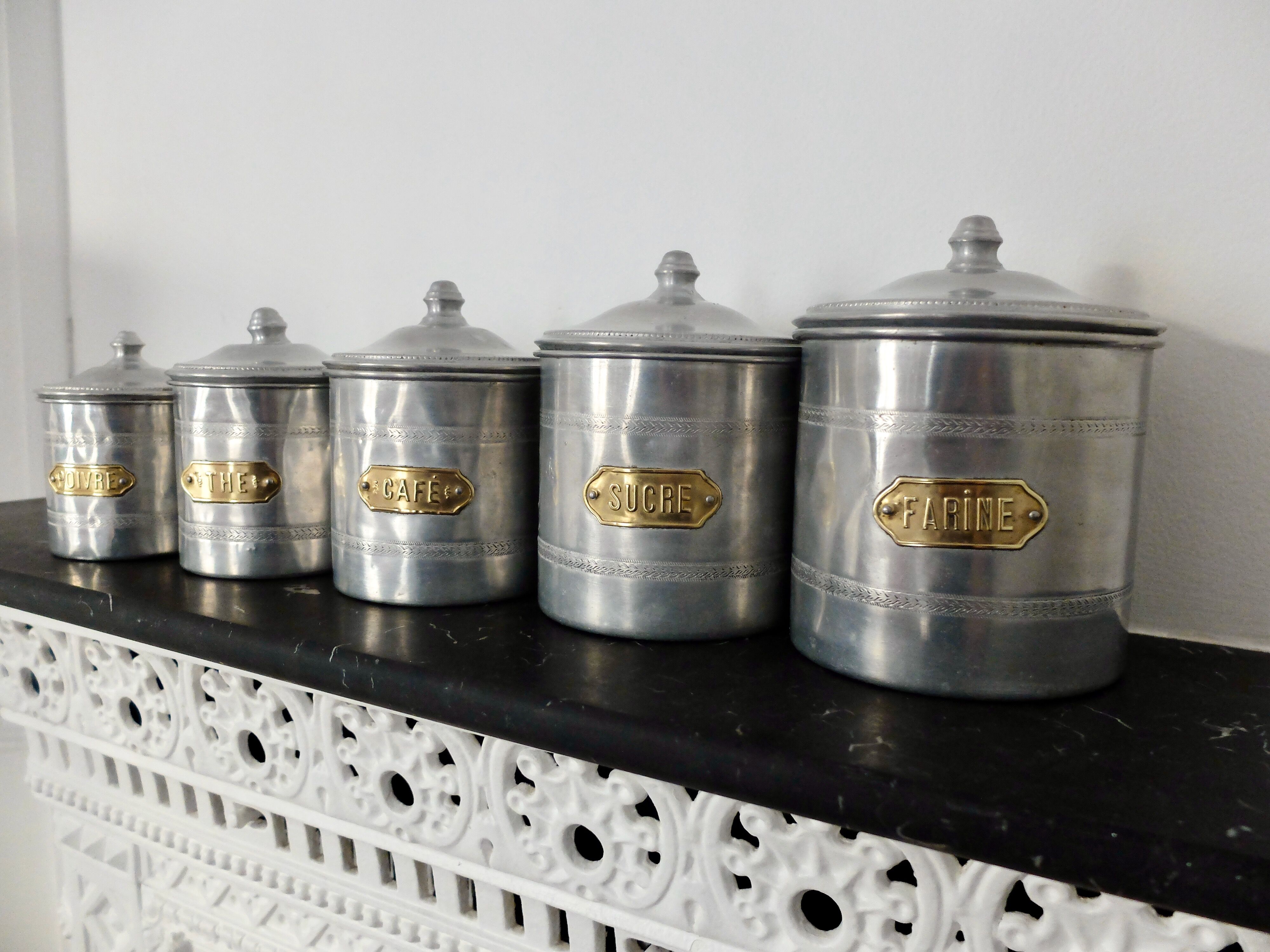 Series of 5 tin spice pots
