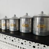 Series of 5 tin spice pots