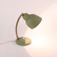 Flexible brass and green metal bedside lamp, 1950s.