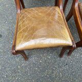 4 Regency chairs in solid wood and brown-beige leather from the 19th century.