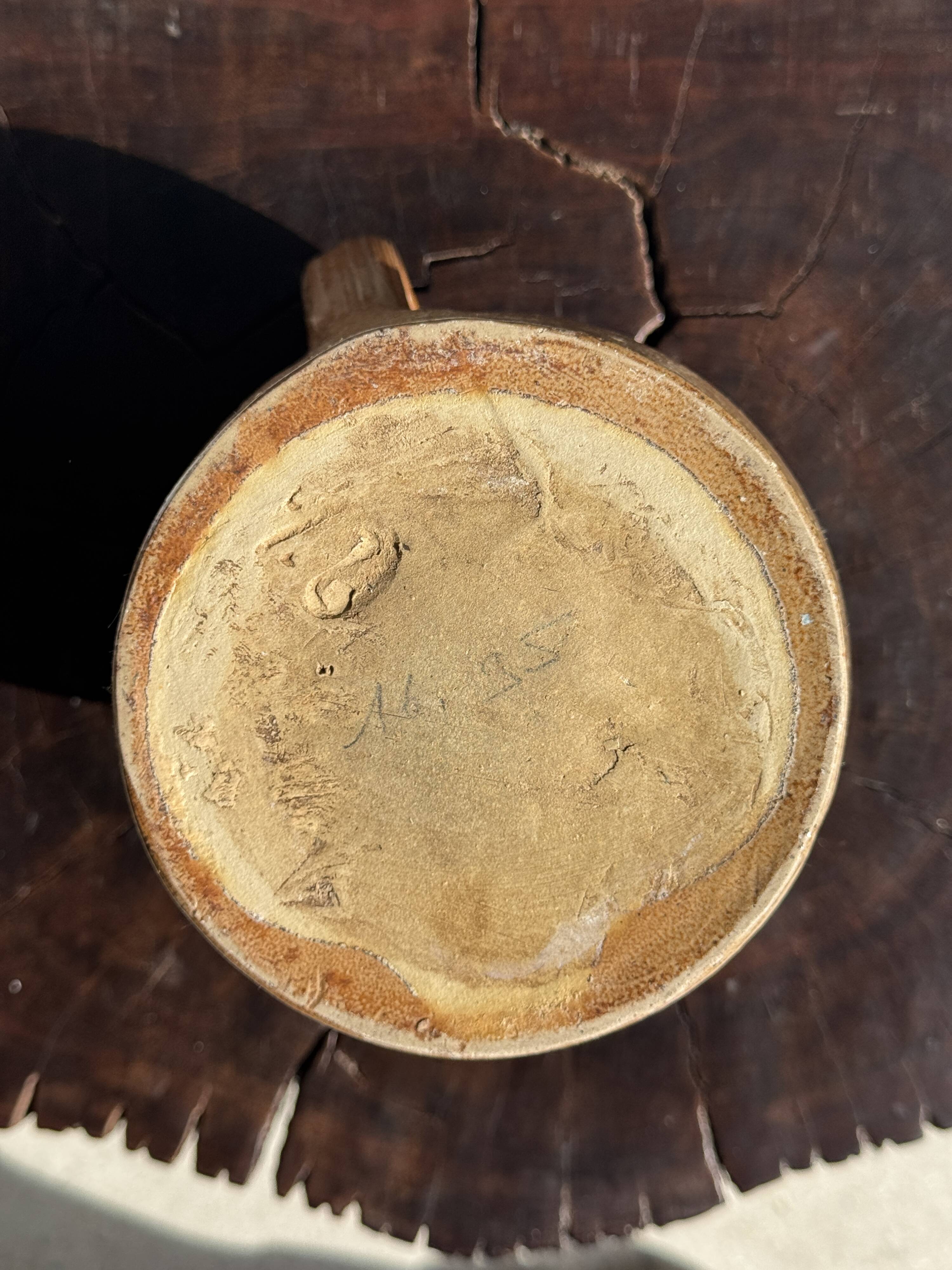 Large stoneware jug marked with pencil underneath H20 D11.