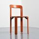 Rey chairs in stained red beech by Bruno Rey