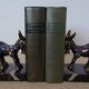 Bookends in the style of stylised donkeys, patinated metal and marble - circa 1940-1950.