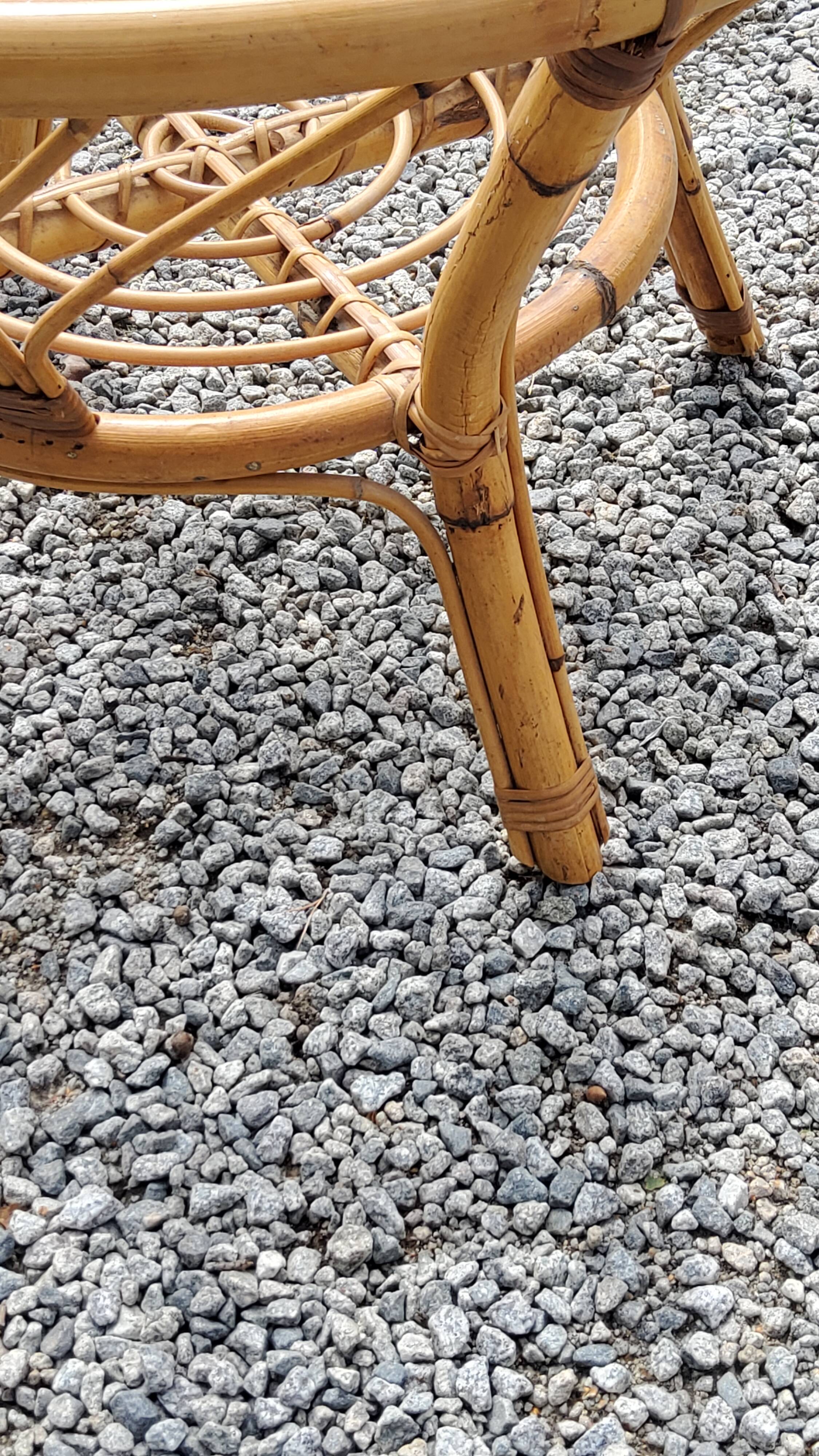 Round rattan coffee table with glass top from the 70s