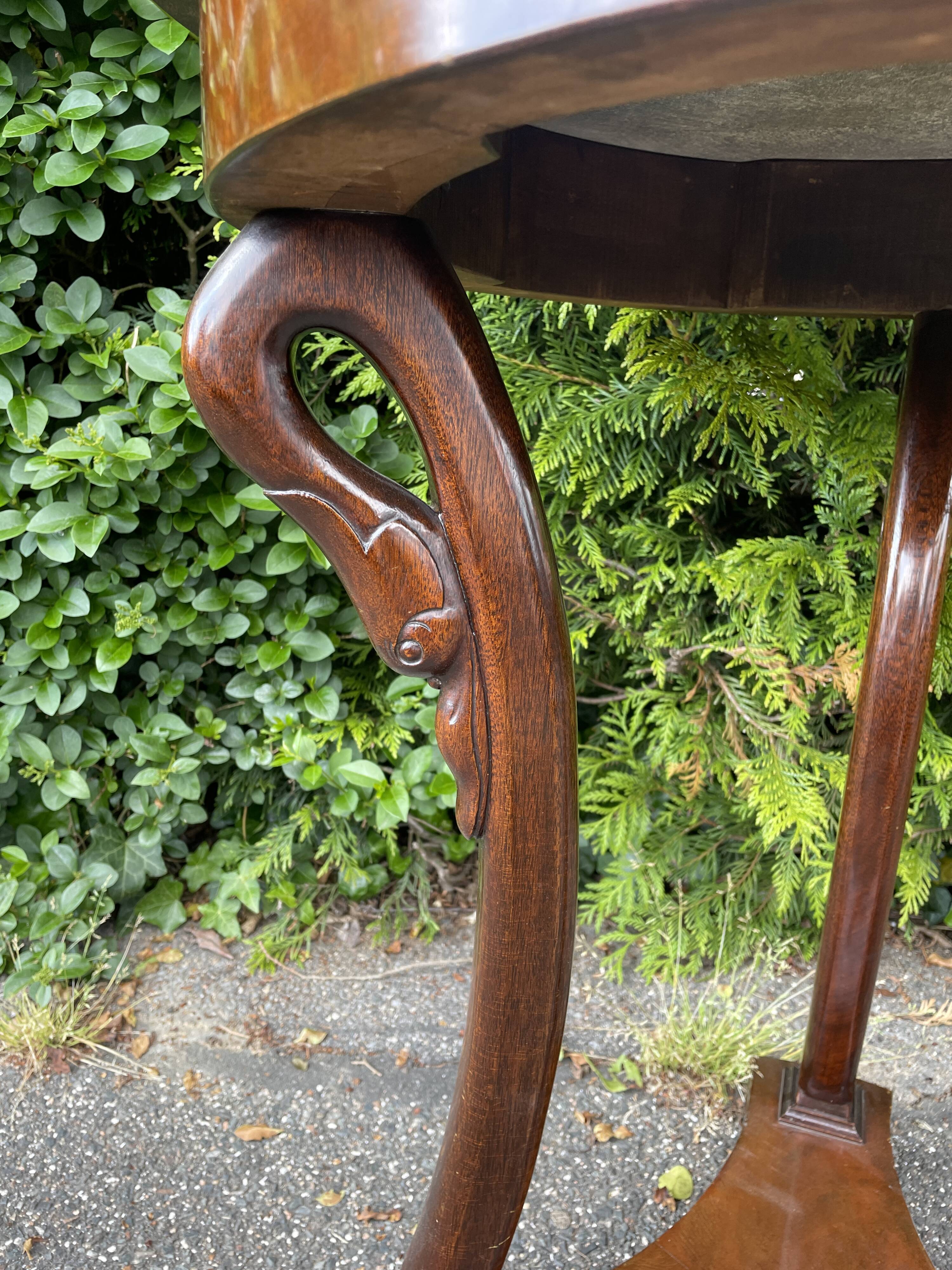 Empire style pedestal table with gooseneck, marble top.