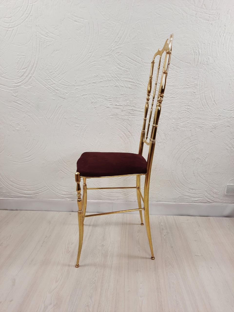 Pair of chiavarine chairs, brass