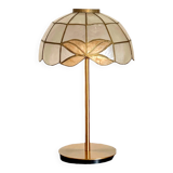 Table lamp with a vintage mother-of-pearl lampshade set and a golden foot