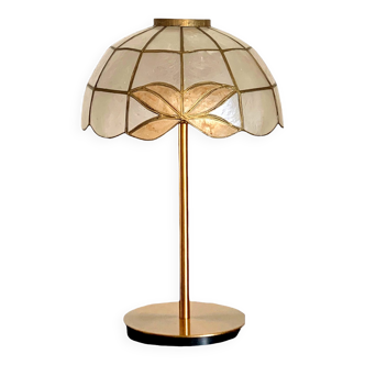 Table lamp with a vintage mother-of-pearl lampshade set and a golden foot