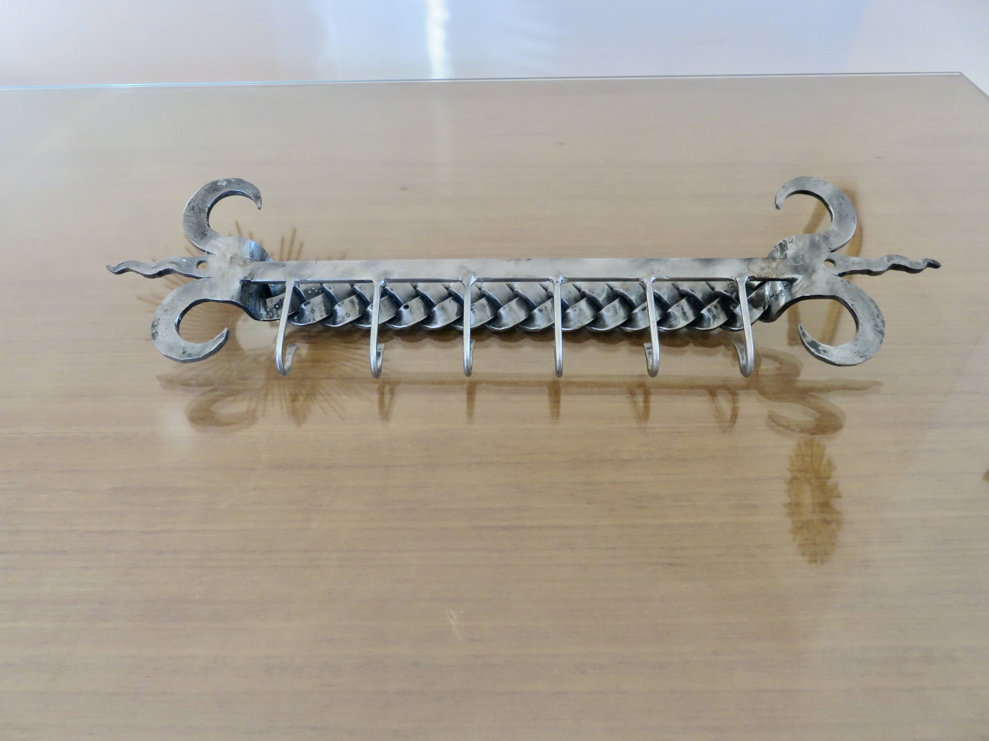 2 Tea towel holders, ironwork in braided raw steel, 1970