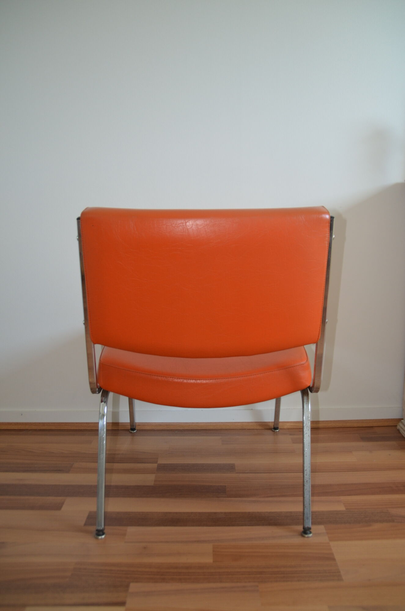 Armchair modernist vintage in orange leatherette 60 years