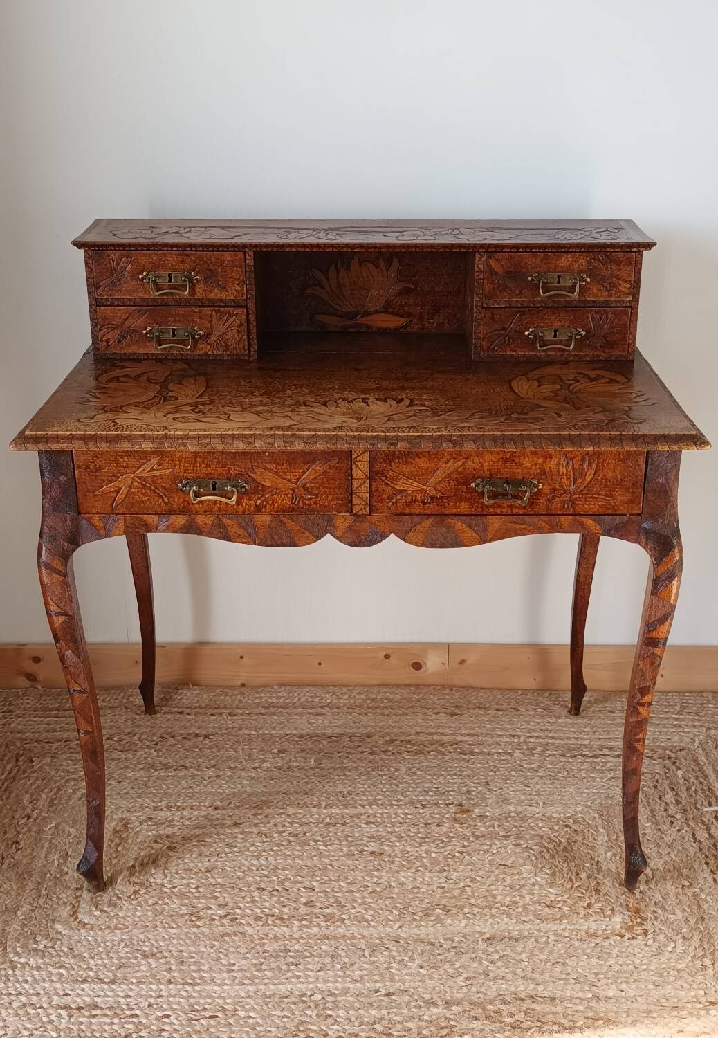 Secretary with carved shelves, early 20th century.