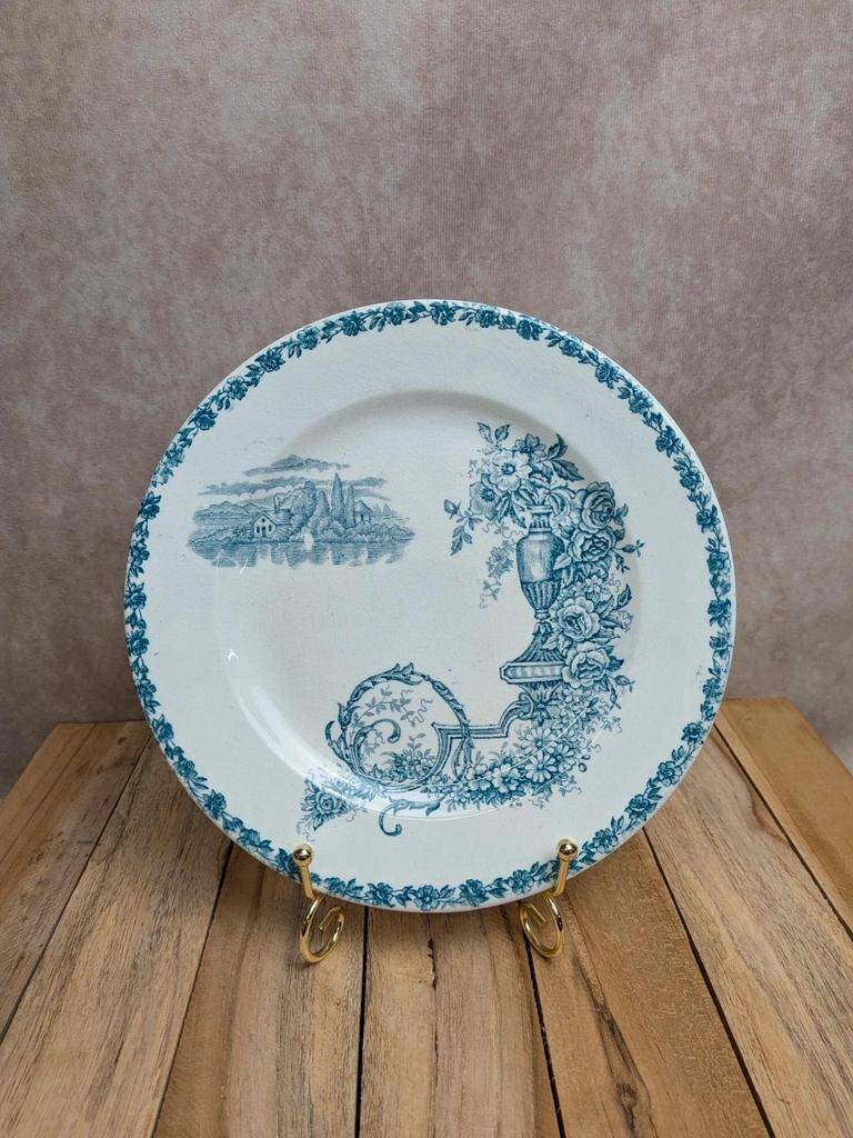Dessert plate in ironstone Clairefontaine model Buffon blue with old landscape decoration.