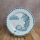 Dessert plate in ironstone Clairefontaine model Buffon blue with old landscape decoration.