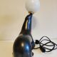 Lampe otarie noire irisée bleue en terre cuite