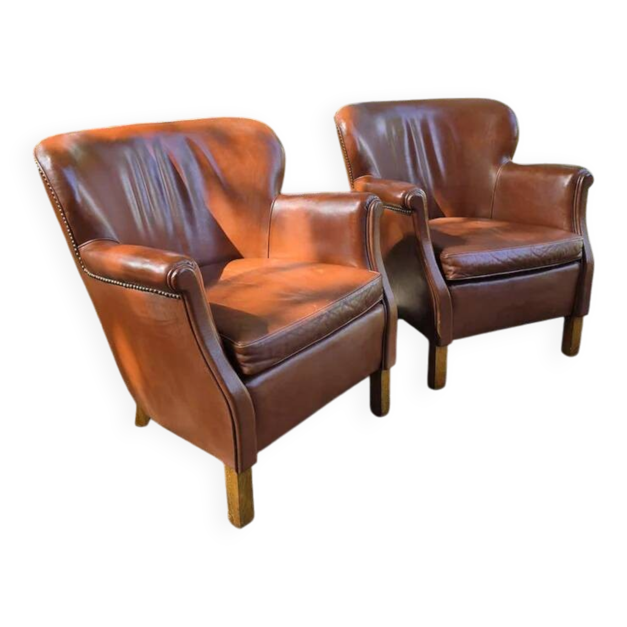 Chaises longues en cuir, design danois. Style urbain moderne.